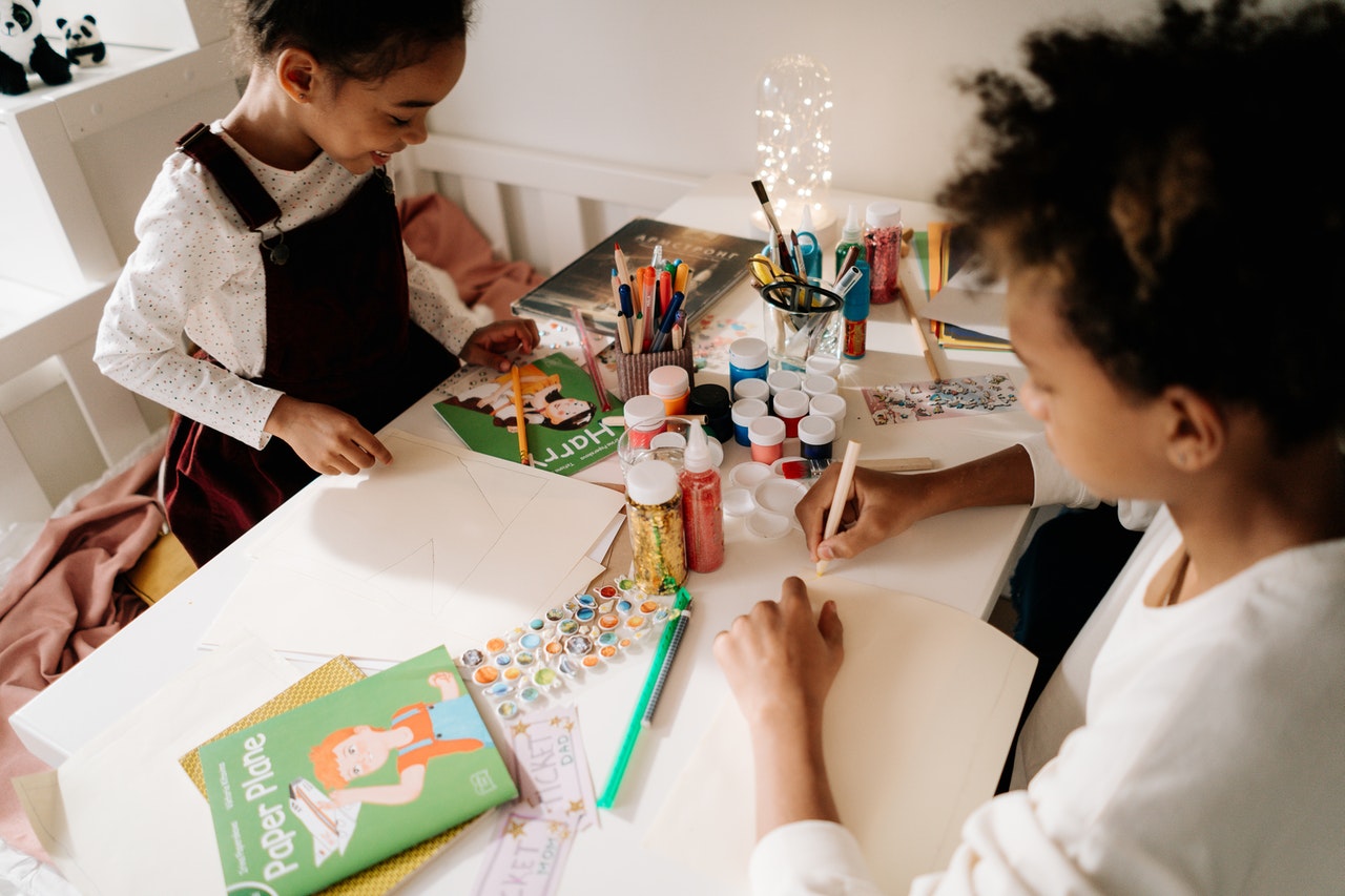 Happy Children Enjoying Art Through Painting