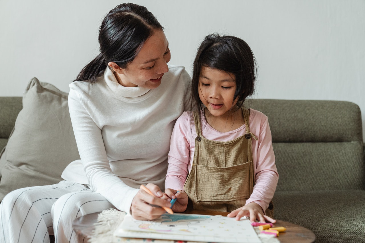 Mother And Daughter Bonding And Enjoying Time Through Art